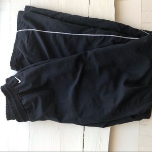 NIKE TRACK PANTS SIZE SMALL BLACK W/ WHITE LOGO